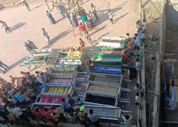 نعوش نقل جثامين الضحايا إلى مثواهم الأخير